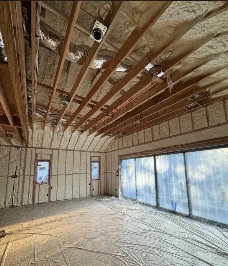 Interior walls and ceiling insulated with spray foam during new construction in Tahlequah
